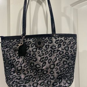 Never used coach black and silver tote bag with little zip bag. Gorgeous!